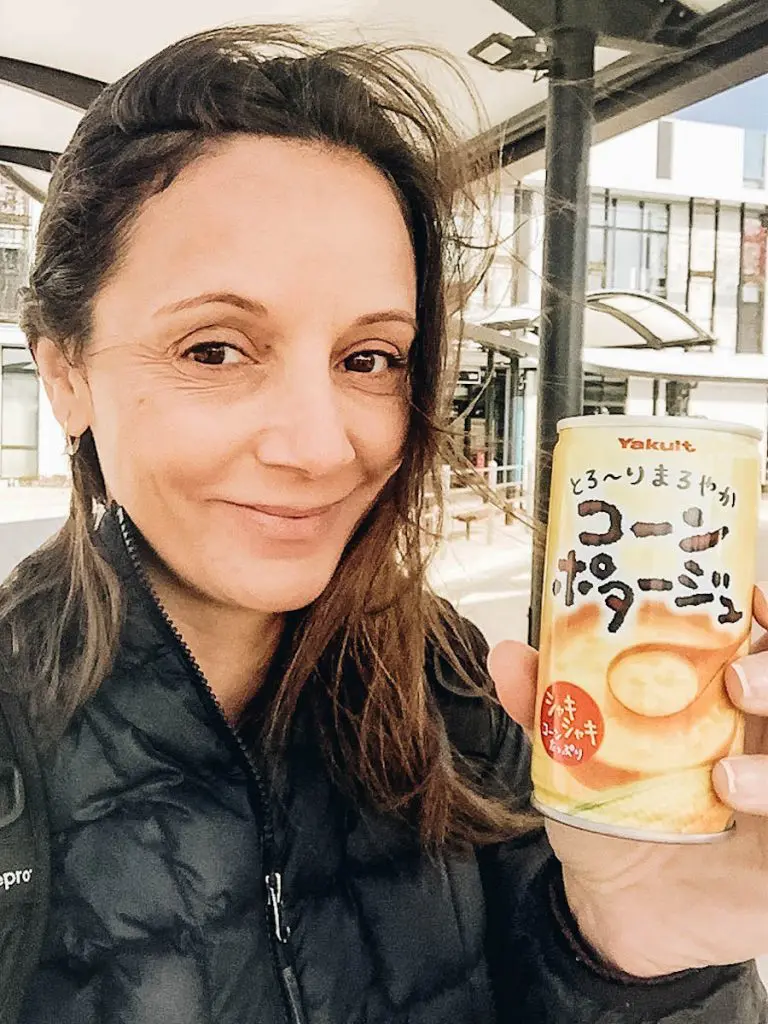 Annette White eating from Vending Machines in Japan