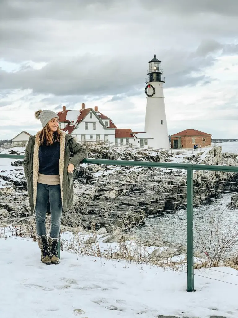 Annette standing near the Portland Head Light