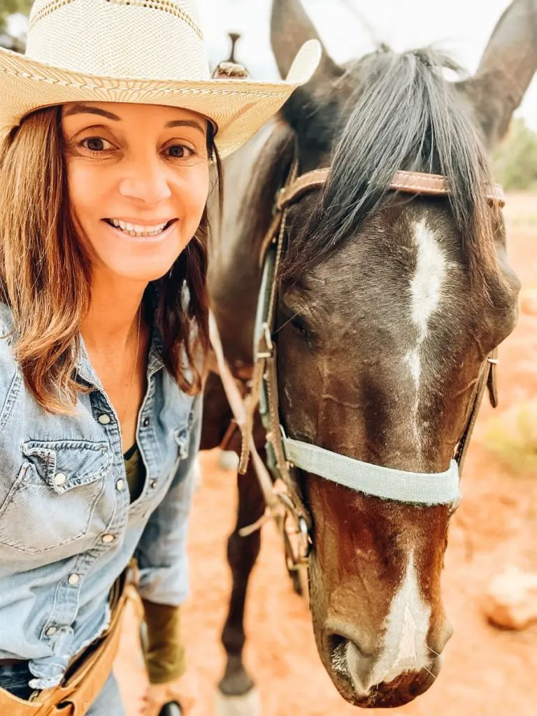 Annette with a horse on Canyon Trails Ranch