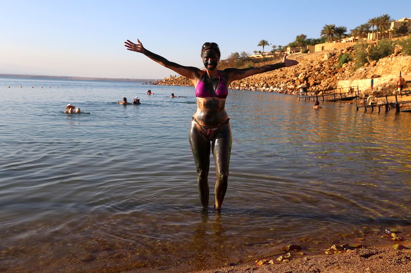 Dead Sea Jordan Annette Annette White covered in the Dead Sea mud in Jordan