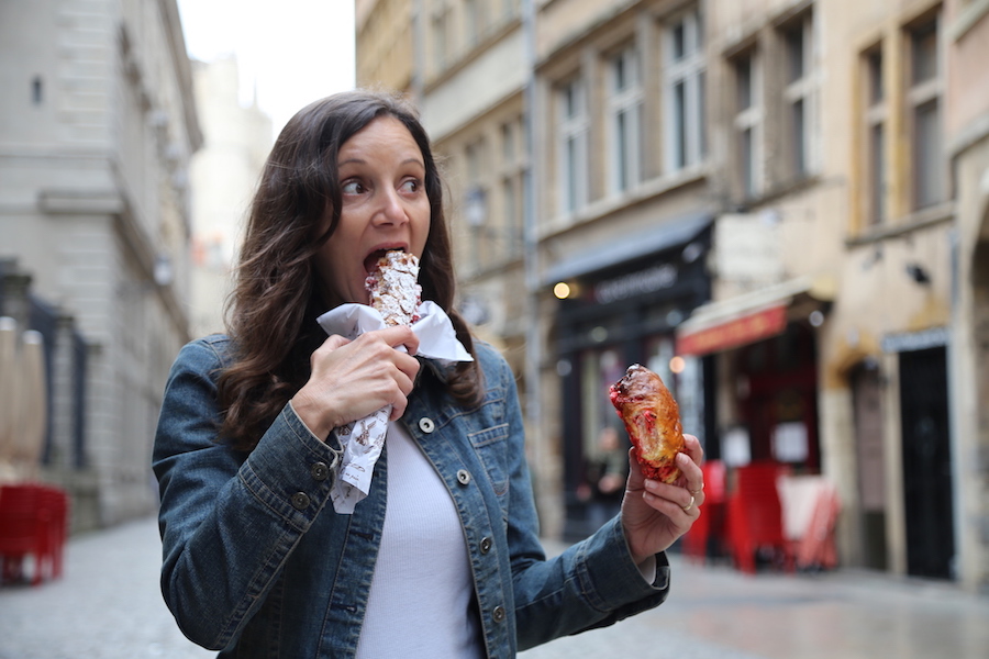 Annette White Eating French pastries in Lyon