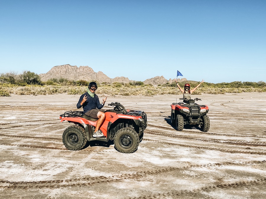 Annette and Pete riding on ATV