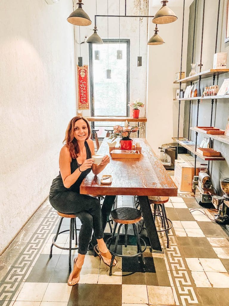 Annette White immersed in the Saigon Coffee Culture