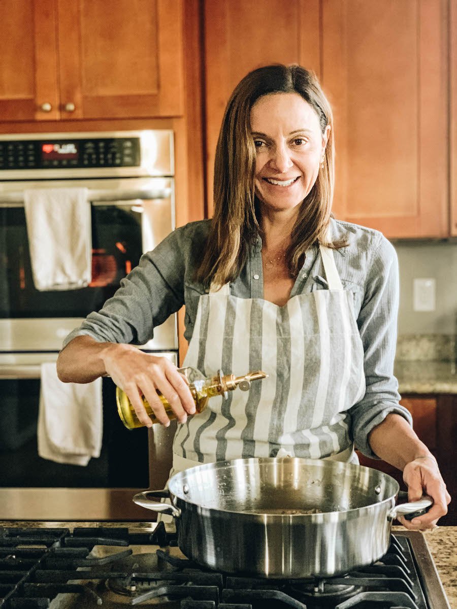 Annette cooking in her kitchen