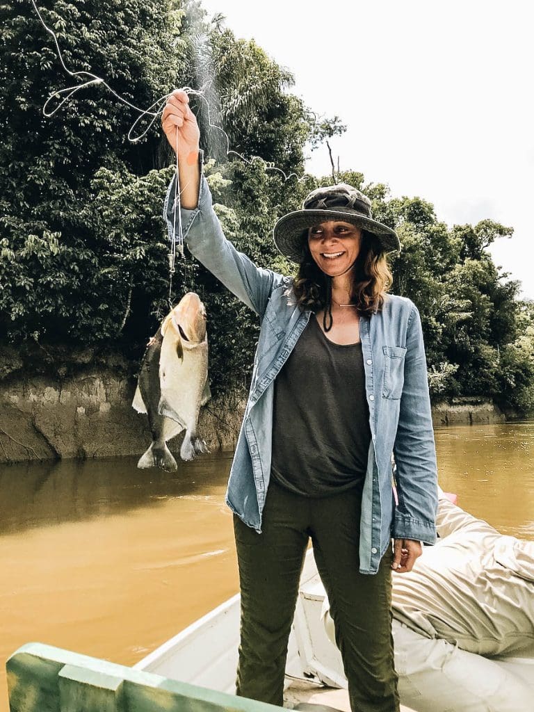 Annette showing the fish she caught