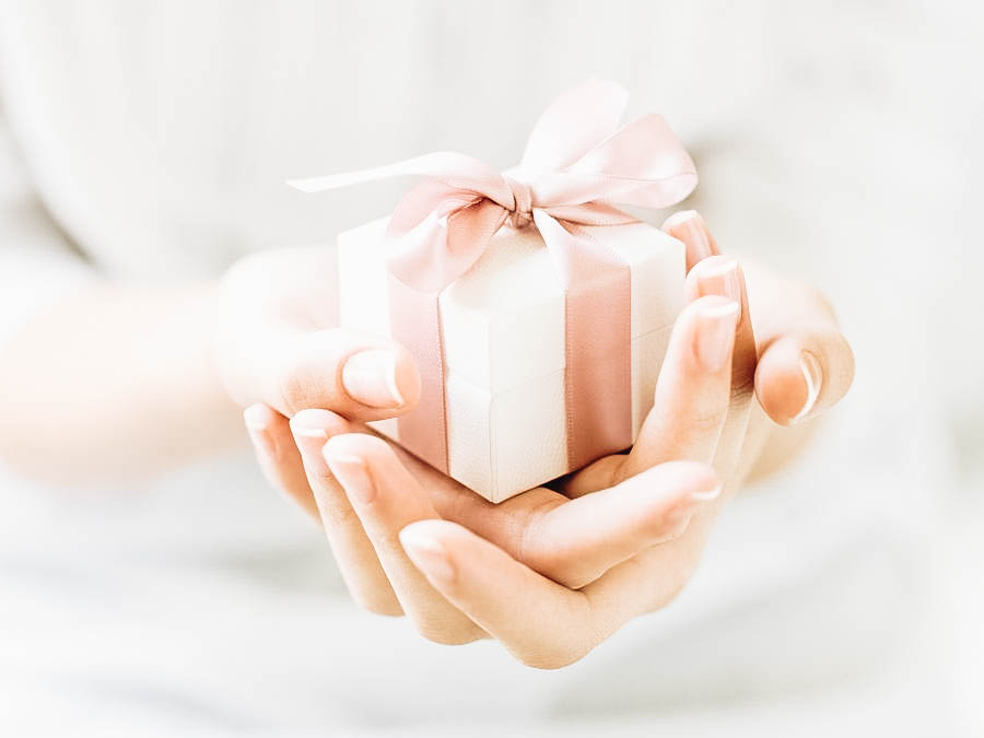 A person holding a gift