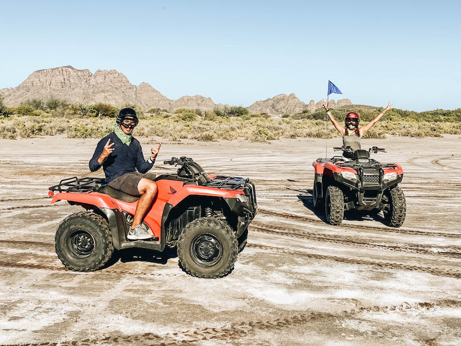 Annette and Peter riding an ATV