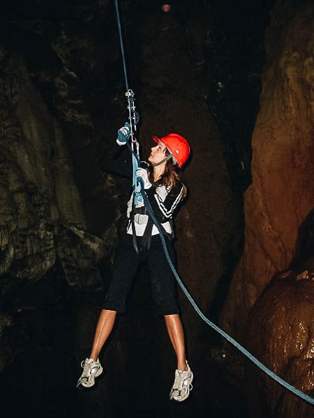Annette Rappeling into a Cave