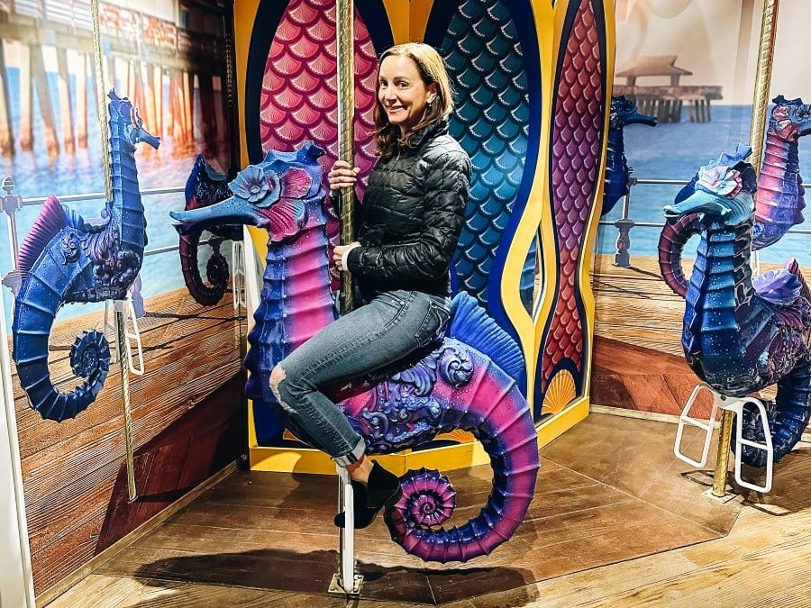 Annette riding a sea horse at Branson Aquarium