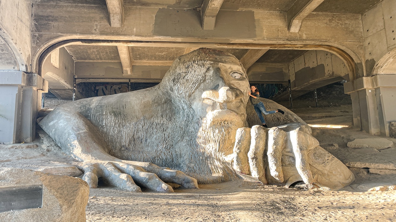 Giant concrete troll under a bridge